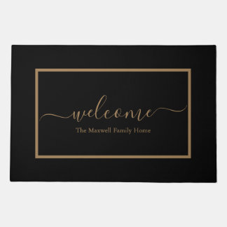 Elegant black and gold script family name welcome doormat