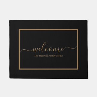 Elegant black and gold script family name welcome doormat