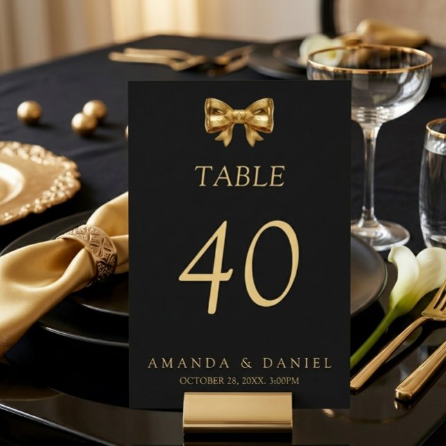 Elegant Black and Gold Wedding Golden Bow Table Number (Creator Uploaded)