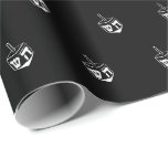 Elegant black and white dreidel pattern Hanukkah Wrapping Paper<br><div class="desc">Elegant black and white dreidel pattern minimalist modern Hanukkah gift Wrapping Paper.

White dreidel pattern on black background.

Dreidel (a spinning top with four sides,  each inscribed with a letter of the Hebrew alphabet) 

This wrapping paper is great for Hanukkah,  Chanukah,  bar mitzvah,  bat mitzvah,  Shabbat and Jewish Holidays.</div>