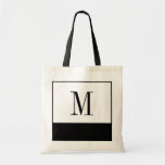 Elegant Black and White Monogram Bag<br><div class="desc">If you're looking for a bridesmaid bag or a unique personalized bridesmaids gift idea, these elegant little black and white bags are the answer! The bag is available in all different sizes, and come in a white background with a large black color block on the bottom. Each bag can be...</div>