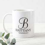 Elegant Black and White Personalized Bridesmaid Coffee Mug<br><div class="desc">Elegant Black and White Personalized Bridesmaid Gifts
featuring personalized monogram in elegant calligraphy font style with bridesmaid's name and title in classic serif font style.

Also perfect for Maid of Honor,  Flower Girl,  Mother of the Bride and more.</div>