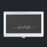 Elegant Black and White Script Name Personalized   Business Card Case<br><div class="desc">A clean and sophisticated business card case featuring a solid black backdrop with an elegant white calligraphy-style name centered for a refined personal touch. This look is perfect for professionals, entrepreneurs, or students who want a minimalist aesthetic with a stylish, modern edge. The contrast of dark and light keeps it...</div>