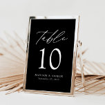 Elegant Black and White Wedding Table Number<br><div class="desc">Trendy, minimalist wedding table number cards featuring white modern lettering with "Table" in modern calligraphy script. The design features a black background or a color of your choice. The design repeats on the back. To order the black and white table cards: add your name, wedding date, and table number. Add...</div>
