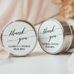 Elegant Black Calligraphy Thank You Wedding Favor Classic Round Sticker<br><div class="desc">These elegant white and black calligraphy thank you favor stickers are perfect for a simple wedding. The neutral design features a minimalist sticker decorated with romantic and whimsical typography. Personalize the sticker labels with your names, the event (if applicable), and the date. These stickers can be used for a wedding...</div>