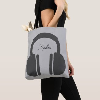Elegant Black Earphones and Script