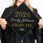 Elegant Black Gold 2026 Graduate Name Graduation Cap Topper<br><div class="desc">An elegant graduation cap topper featuring "2026" and "GRADUATE" in luxe gold lettering, a personalized white script name, and a refined decorative flourish on a sophisticated black background. A timeless keepsake for celebrating high school, college, or university graduates at the graduation ceremony, graduation party, or as a personalized gift. The...</div>