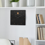 Elegant black gold monogram name personalized square wall clock<br><div class="desc">Luxury monogrammed square wall clock with a black leather look background and a faux gold copper metallic brushed square with elegant script signature name and monogram initials. Easy to personalize and create your own logo with your business or personal initials and name. Could be an elegant personalized gift for a...</div>