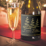 Elegant Black & Gold Stylized Christmas Trees Sparkling Wine Label<br><div class="desc">These sparkling wine bottle labels are perfect for a Christmas gift, holiday party or other festive occasion. The design features three stylized Christmas trees fashioned to look as if they are made from gold ribbon and stars. The caption reads: Warmest Wishes, with space for your name and the type of...</div>