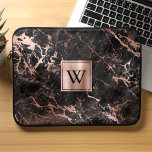 Elegant Black Marble Rose Gold Monogram Laptop Sleeve<br><div class="desc">This elegant laptop sleeve features a background pattern of black marble embellished with rose gold veins. Personalize it with your monogram initial in black on a rose gold brushed metal square.</div>