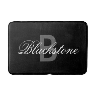 Elegant black monogram bath mat for bathroom