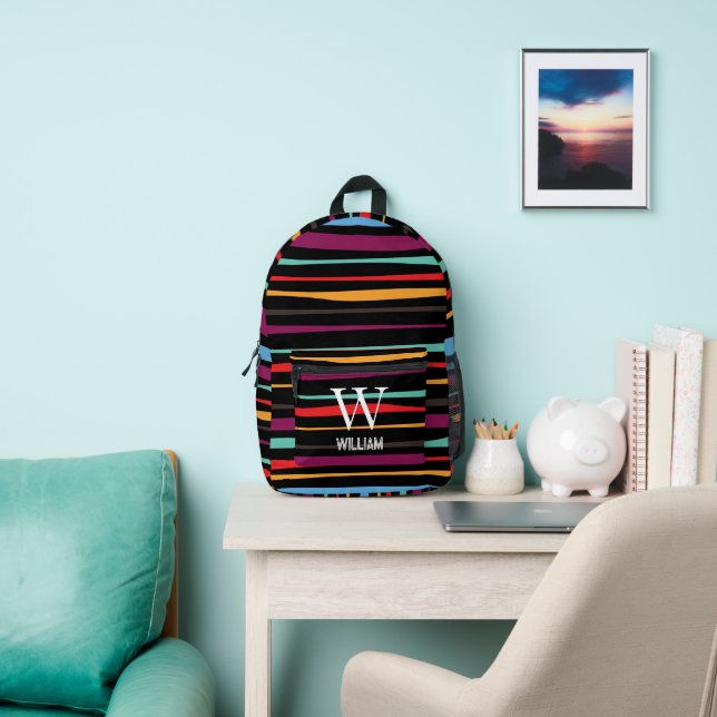 Elegant black orang stripes monogram script name printed backpack (Insitu)