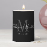Elegant Black White Monogram Newlywed Wedding Pillar Candle<br><div class="desc">Get in the mood with this Elegant Black White Monogram Newlywed Wedding Pillar Candle. This is a modern customizable design is in black, white and grey. Bride and groom's first names are on the center in modern white handwriting script lettering and initial of new last name is in grey. Established...</div>