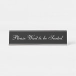 [ Thumbnail: Elegant Black & White "Please Wait to Be Seated" Desk Name Plate ]