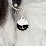 Elegant Black With Faux White Marble Texture & Paw Pet ID Tag<br><div class="desc">Destei's sophisticated design featuring a faux white marble texture image on top and wavy bottom area in classic black color. On the bottom there is a curved text template area perfect for a name on the front and a phone number on the back. There is also a small white dog...</div>
