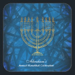 Elegant Blue and Gold Hanukkah Square Sticker<br><div class="desc">Elegant Blue and Gold Hanukkah Stickers. Elegant navy blue,  textured watercolor effect with a traditional gold menorah. This is a modern,  sophisticated Hanukkah sticker.
Coordinating party supplies are available Elegant Hanukkah collection at MetroEvents on Zazzle.</div>