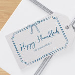 Elegant Blue Bow Personalized Happy Hanukkah Gift Tags<br><div class="desc">Featuring a delicate blue wavy border and a sweet bow detail,  these tags brings a touch of warmth and sophistication to your Hanukkah gifts. Personalize it with your family name to make it truly special. Ideal for families seeking a modern yet traditional touch for their Hanukkah parties.</div>