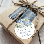 Elegant Blue Hydrangea Floral Wedding Thank You Classic Round Sticker<br><div class="desc">Elegant floral wedding design with watercolor-painted floral arrangements of blue hydrangea flowers,  greenery,  and white roses.</div>