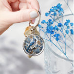 Elegant Blue Jay William Morris Inspired Keychain<br><div class="desc">Elegant Blue Jay William Morris Inspired Keychain! This exquisite keychain effortlessly combines the timeless elegance of William Morris-inspired design with the enchanting beauty of a blue jay. Elevate your daily essentials with this sophisticated and nature-inspired accessory. This keychain is a stunning addition to your keyring. Its unique design captures the...</div>