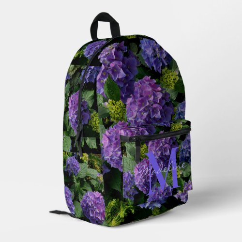 Elegant blue purple green floral monogram printed backpack
