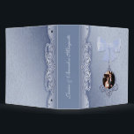 Elegant Blue Wedding Photo Album Binder<br><div class="desc">Romantic wedding album binder done in a elegant light blue damask background. Graphic artwork of a lovely flourish left side, wraps around to the backside of the binder. A light blue bow and a dangling ornate round photo frame decorates the front. Text, on the spine, and photo are ready to...</div>