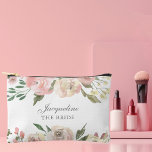 Elegant Blush Pink Floral Personalized Bride Accessory Pouch<br><div class="desc">An elegant floral bouquet of pink peonies and ivory roses decorate these lovely personalized gift for the bride at her bachelorette party. Customize this beautiful present between the pretty flowers.</div>