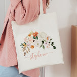 Elegant Blush Watercolor Floral Personalized Name Tote Bag<br><div class="desc">This is a personalized tote bag featuring beautiful blush watercolor florals. All fonts and wording are editable // For matching items, please visit the "TOTE BAG" collection in the By Nicole Designs Zazzle store. * If you like this design but don't see it available for something you are looking for,...</div>