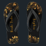 Elegant Bride Tribe Black & Gold Foliage Pattern Flip Flops<br><div class="desc">These elegant bride tribe black and gold foliage pattern flip flops boasts a luxurious black and gold palette, with a stunning golden floral pattern and modern typography set against a black background, exuding elegance and sophistication. It's a beautiful gift for your bridal tribe. View the collection on this page to...</div>