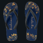 Elegant Bridesmaid Gold Floral Navy Blue Flip Flops<br><div class="desc">These elegant bridesmaid gold floral pattern navy blue flip flops have a dark blue background that is adorned with an intricate gold floral greenery pattern and customizable modern typography. The combination of the rich navy and the shimmering gold create an elegant and luxurious aesthetic. It's a beautiful gift for your...</div>