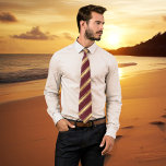 Elegant Burgundy Gold Striped Wedding Groom Tie<br><div class="desc">Elegant tie featuring a gold striped design on burgundy. You can also use the striped design on the back of the tie if you want (see advanced editor,  use copy/paste) The colors of this tie match a beach wedding collection. Beautiful for groom and/or groomsmen or other family members.</div>