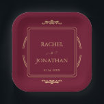 Elegant Burgundy Gold  Wedding Paper Plate<br><div class="desc">Complete your formal event décor with these exquisite personalized paper plates. The opulent design features a deep burgundy hue and a goldish frame, highlighting the names of the couple and their special date. These paper plates are an elegant, convenient solution for serving e.g cake at your wedding reception, rehearsal dinner,...</div>