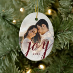 Elegant Burgundy Joy Script Photo Christmas  Ceramic Ornament<br><div class="desc">A simple,  elegant photo ornament,  featuring stylish text,  reading "Joy" in a pretty script font. The back contains a snow design over a matching background color. Great for a newlywed first Christmas or for anyone!</div>
