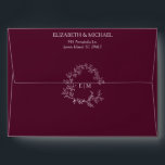 Elegant Burgundy Leafy Crest Monogram Wedding Envelope<br><div class="desc">Let us help make the perfect beginning to your special day with our Modern Burgundy Leafy Crest Monogram Wedding envelope. Featuring a hand-drawn leafy wreath encircling a modern wedding monogram, this one-of-a-kind envelope will put an extra special touch on your special occasion. Crafted to the highest standard, you can trust...</div>
