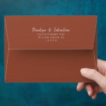Elegant Burnt Orange Handwritten Script Wedding Envelope<br><div class="desc">A minimalist boho burnt orange   wedding envelope with return address. Which features simple dark brown terracotta solid color . With with white handwritten calligraphy of the bride's and groom first names along with the personalized return address label . And customizable return address info..</div>
