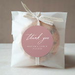 Elegant Calligraphy Dusty Rose Wedding Thank You Classic Round Sticker<br><div class="desc">Elegant wedding thank you stickers featuring "thank you" displayed in modern white calligraphy with a dusty rose background. Personalize the dusty rose wedding thank you stickers with your names and wedding date. The chic wedding thank you stickers are perfect for sealing envelopes, wedding favor bags, and more. Designed to coordinate...</div>