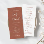 Elegant Calligraphy Minimal Wedding Program<br><div class="desc">Our slim burnt orange wedding program card is perfect for your minimalist wedding celebration this fall. A beautiful white calligraphy font paired with simple and clean text sits on a burnt orange background to the front of the card. The white reverse has tonal terracotta text, creating an elevated look to...</div>