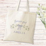 Elegant Chic Bow Floral Personalized Flower Girl  Tote Bag<br><div class="desc">Make your flower girl feel extra special with this chic personalized tote bag! Featuring a beautiful floral design and elegant bow, this tote is perfect for carrying wedding day essentials and makes a memorable gift. Customize with her name to add a personal touch that she'll cherish forever. Ideal for brides,...</div>