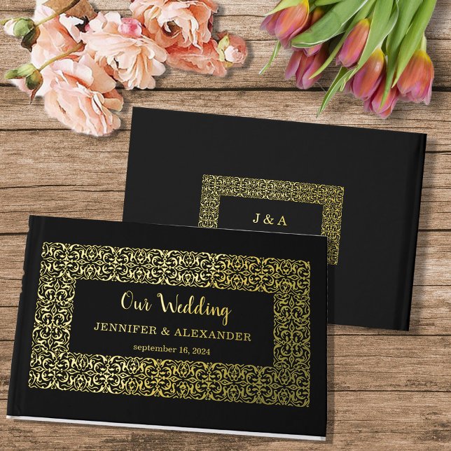 Elegant chic gold frame on black gold foil foil guest book  (Chic elegant frame, monogrammed gold foil wedding guestbook.)