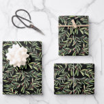 Elegant Christmas Branches and Berries Wrapping Paper Sheets<br><div class="desc">Branches of green leaves and berries on black Christmas wrapping paper sheets are fun for your holiday gift-giving. MATCHING items in our collection.</div>