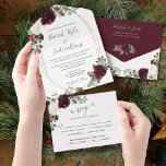 Elegant Christmas Burgundy Winter Wedding All In One Invitation<br><div class="desc">This Christmas winter wedding all in one invitation is perfect for an elegant holiday wedding. The design features beautiful watercolor white and burgundy florals with pine, holy berry and eucalyptus greenery. This is a perfect color scheme for a winter wedding. Make this invitation your own by including your names and...</div>