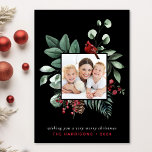 Elegant Christmas Red Cardinal Photo Black Holiday Card<br><div class="desc">Elegant black holiday greeting card featuring your photo framed by a nature-inspired watercolor of a red cardinal and seasonal winter greenery. You can personalize your Christmas greeting, as well as your family names and the year in simple modern red and white typography. On the back, add an additional photo and...</div>