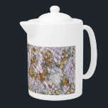 Elegant Colorful Mosaic Illustrated Bird Art Teapot<br><div class="desc">Modern teapot featuring elegant colorful mosaic illustrated bird with the blossoms art. This look can go places and can easily be incorporated into many different styles for your home including farmhouse,  relaxed and informal,  or cookout. Matching items are available. Similar designs are also available.</div>