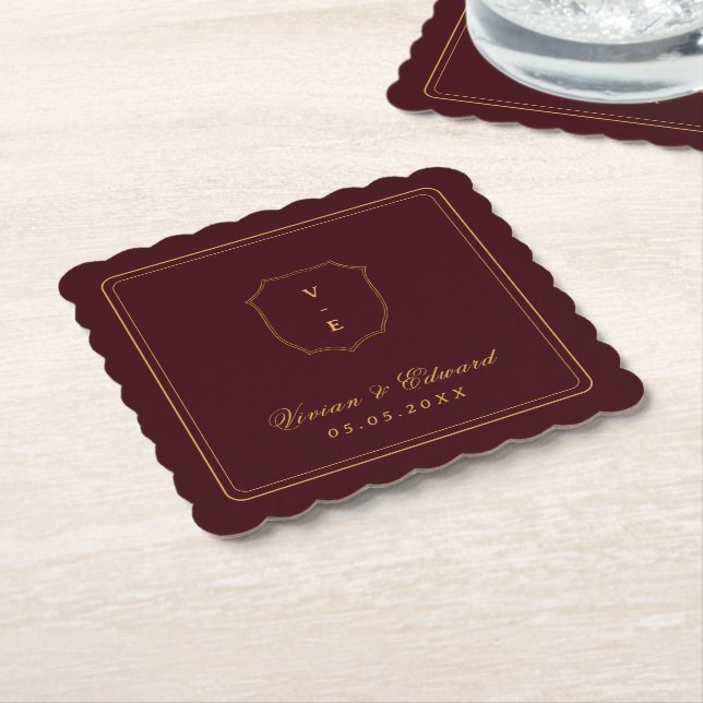 Elegant Crest Monogram Burgundy and Gold Wedding Paper Coaster (Angled)