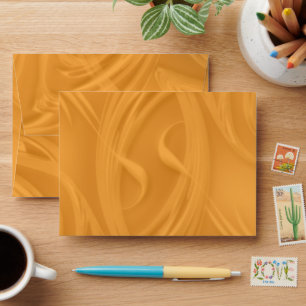 Elegant Curls and Shadows Over Orange Envelope