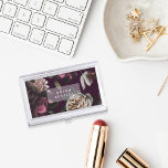 Elegant Dark Floral Personalized Business Card Case<br><div class="desc">Personalize this chic business card holder with your name or business name for an elegant way to store your cards. Design features a background of ivory roses and deep burgundy flowers on a dark and dramatic plum purple background. Add your custom text in modern white lettering. Makes a beautiful gift...</div>