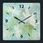 Elegant Dragonflies Art Square Wall Clock<br><div class="desc">Dragonflies and stamped Flowers Wall Clock in soft greens and blues with dragonflies and flowers from Jenn's Emporium.</div>
