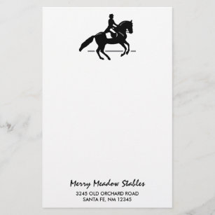 Elegant Dressage Rider Performing a Pirouette Stationery