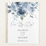 Elegant Dusty Blue Floral Wedding Planner<br><div class="desc">The wedding planner is a breathtakingly beautiful design that exudes a sense of romance and sophistication. The delicate blue hues of the watercolor floral pattern create a sense of tranquility, while the calligraphy script adds an element of elegance and refinement. The overall effect is one of timeless beauty that perfectly...</div>