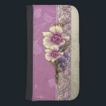 Elegant Embossed Lilac Damask Phone Wallet<br><div class="desc">Beautiful glowing embossed lilac and silver damask with an ornate floral border and tropical vector flowers in lilac and ivory. Note:  Sculpted,  engraved,  embossed and dimensional effects,  layered,  aged or eroded appearance,  textures and shadows achieved digitally. Actual product has a flat surface.</div>