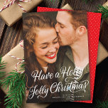 Elegant Festive Holly Jolly Christmas Script Photo Holiday Card<br><div class="desc">This lovely holiday photo card features a white calligraphy script greeting that says "Have a Holly Jolly Christmas" over a full-frame (aka "full-bleed") vertical photo. On the back of the card is a coordinating grey and white diagonal stripe pattern. Add another photo and/or additional text by clicking "design with editor...</div>